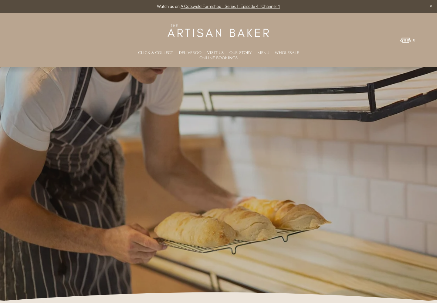 The Artisan Baker homepage with baker and fresh loaves